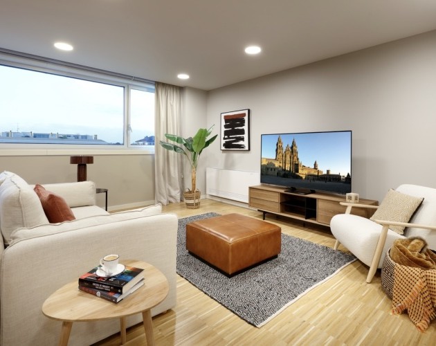 Salón moderno y elegante en I Loft Santiago, con un diseño exclusivo y ubicado en el centro de Santiago de Compostela.